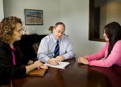Dugan Schlozman  Attorneys with a client